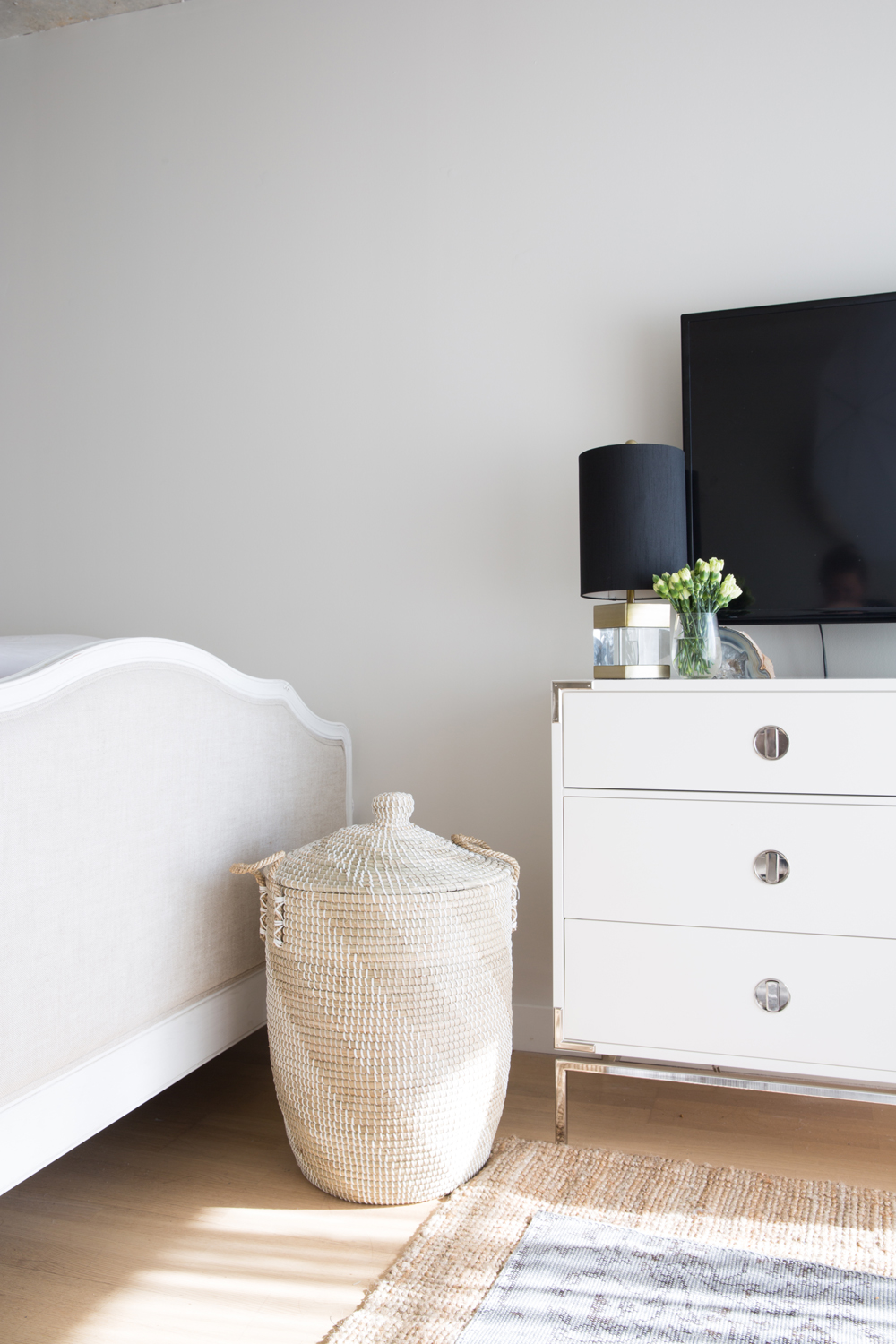 Glossy dresser with straw hamper