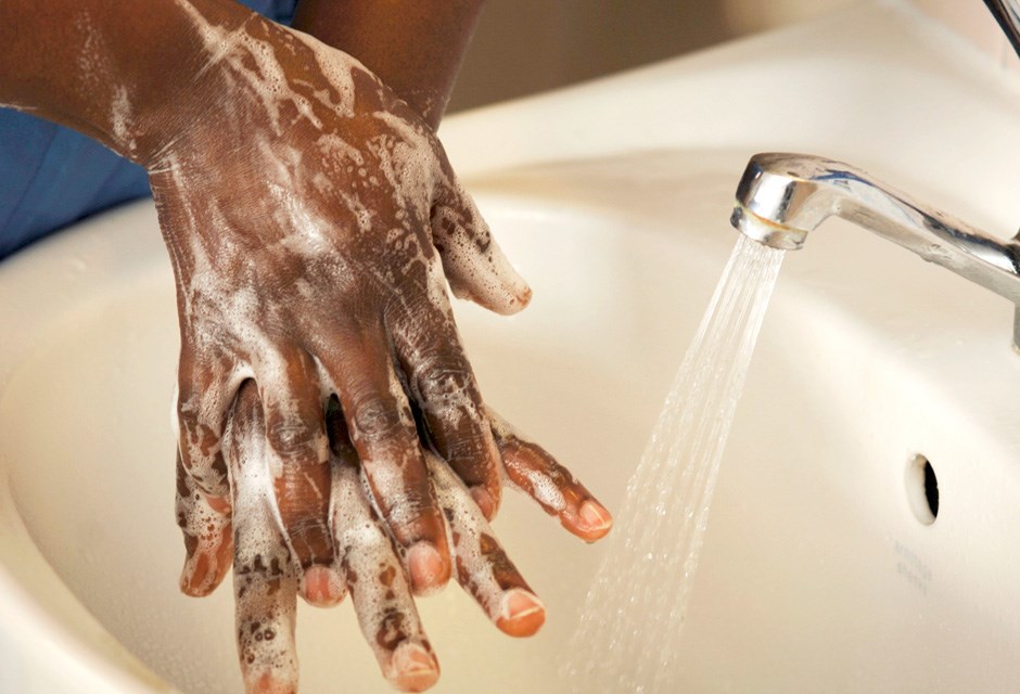 Washing hands in a sink