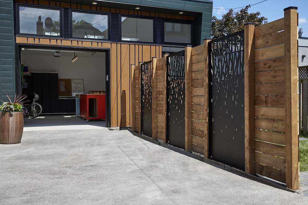 A renovated garage workspace with custom screens and skylights