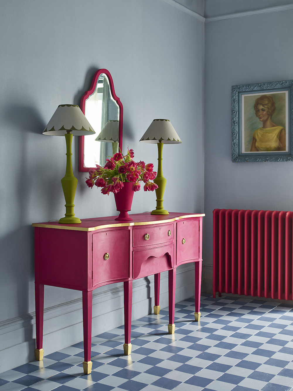 Hot pink pink-painted furniture and radiator against checkered floors