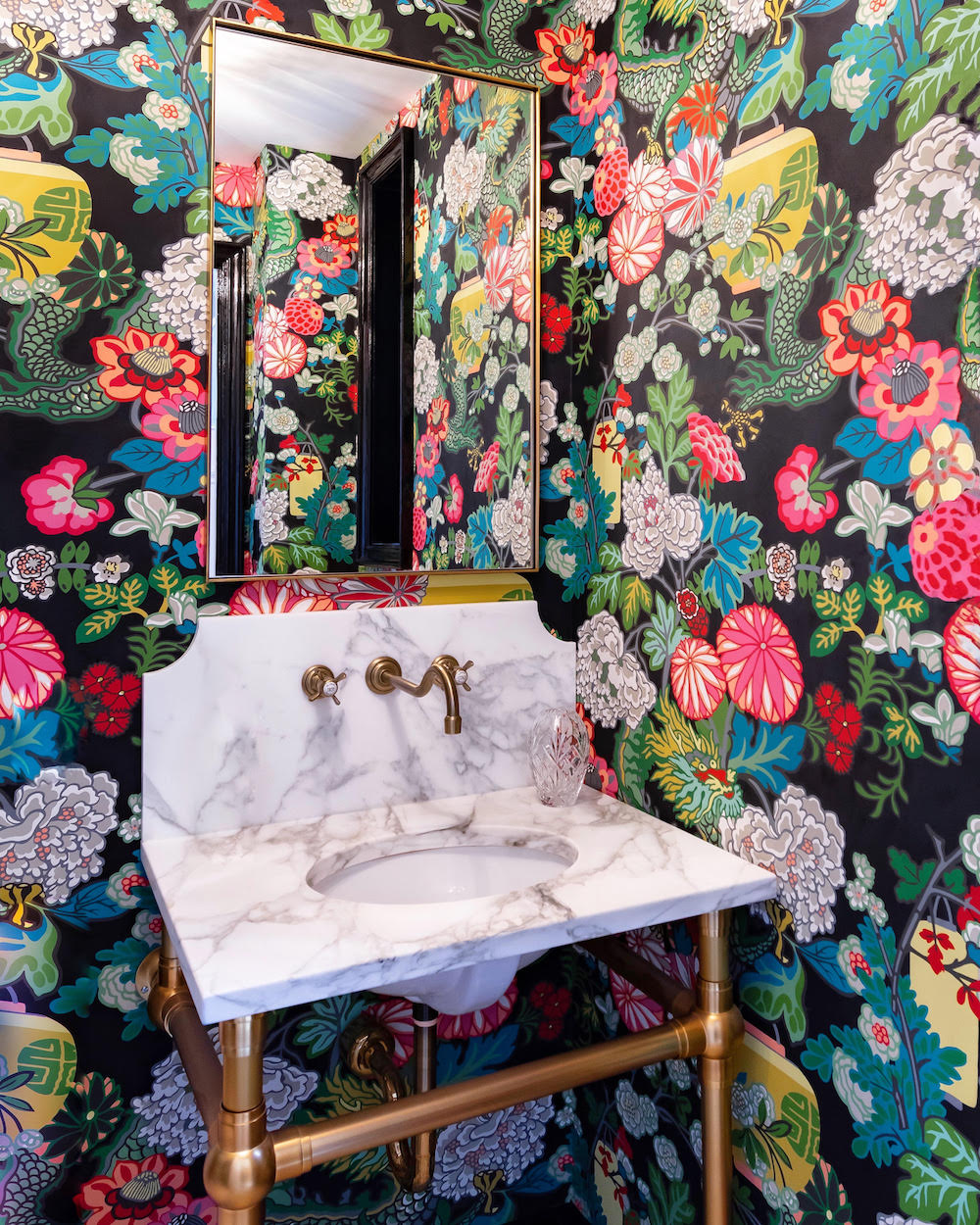 Dramatic floral wallpaper in bathroom