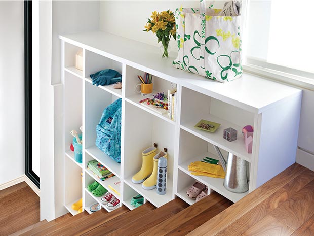 California closets shoe storage in white foyer