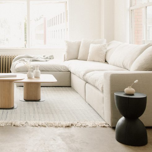 cozy white sectional in Scandi-chic living room