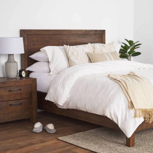 wood bed in comfy modern-rustic bedroom