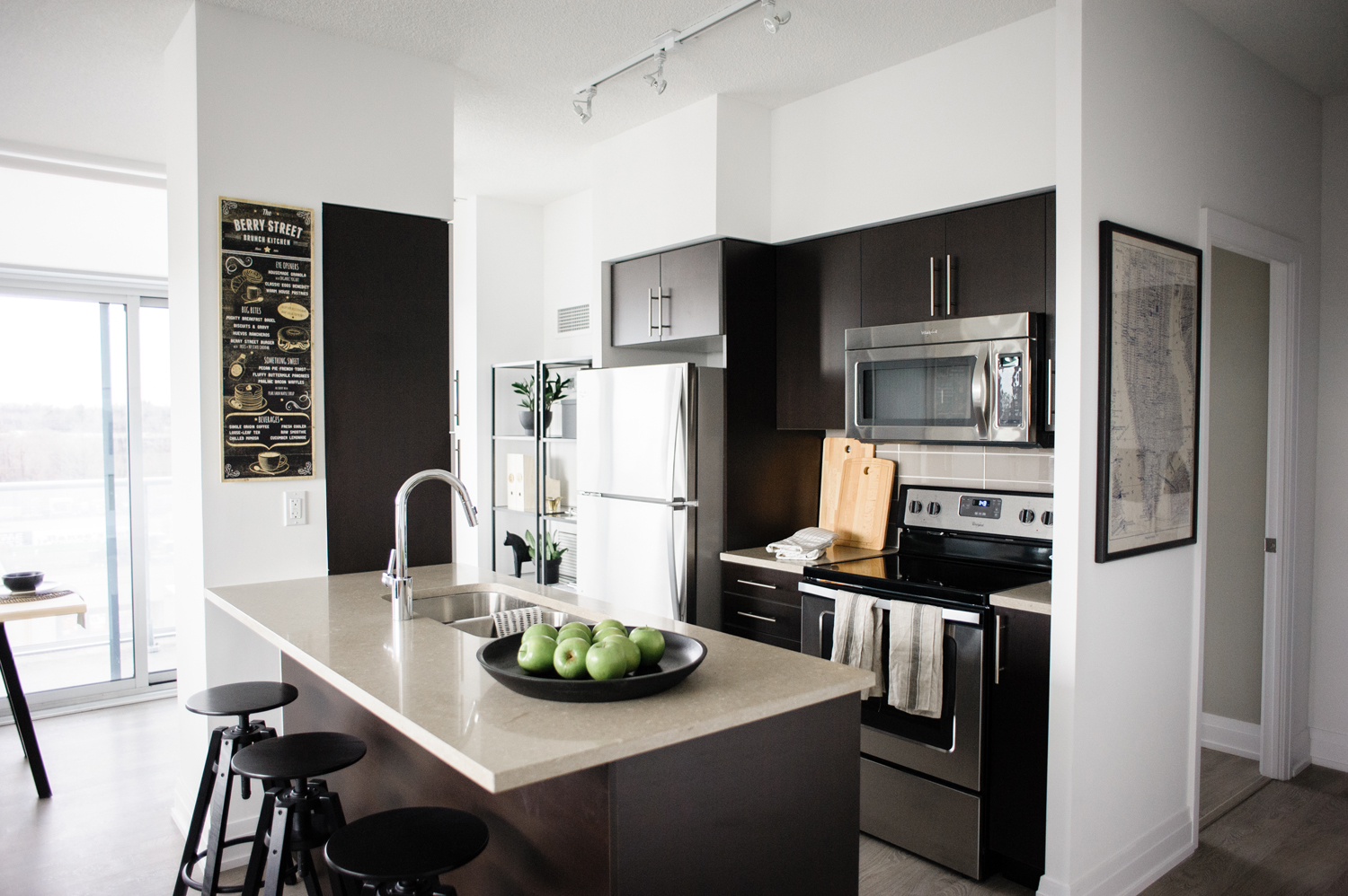 Modern brown condo kitchen