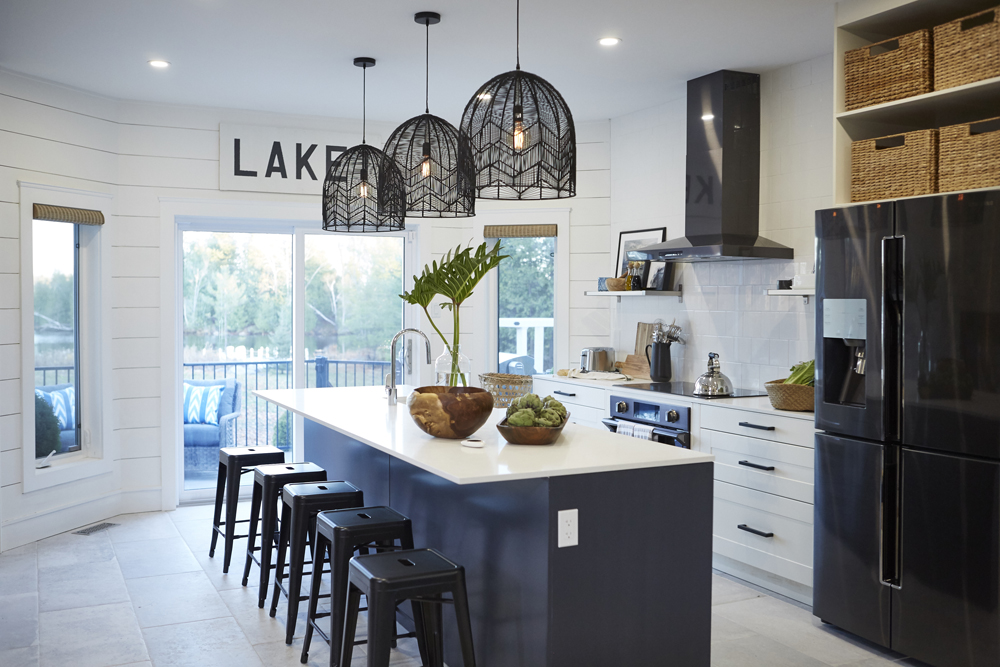 Coastal Vibes Modern white kitchen design with coastal flair.