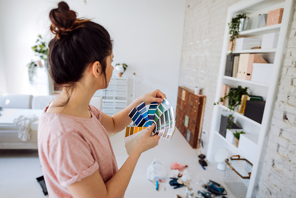 Person looking at colour samples