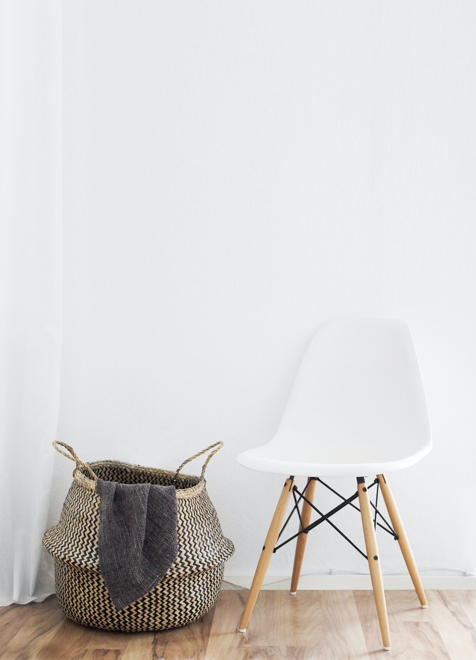 Laundry basket beside chair