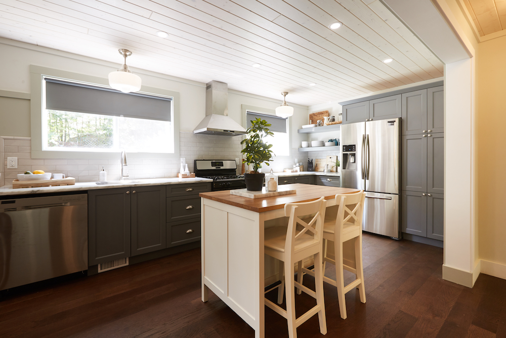 contemporary open-concept grey kitchen with small centre island