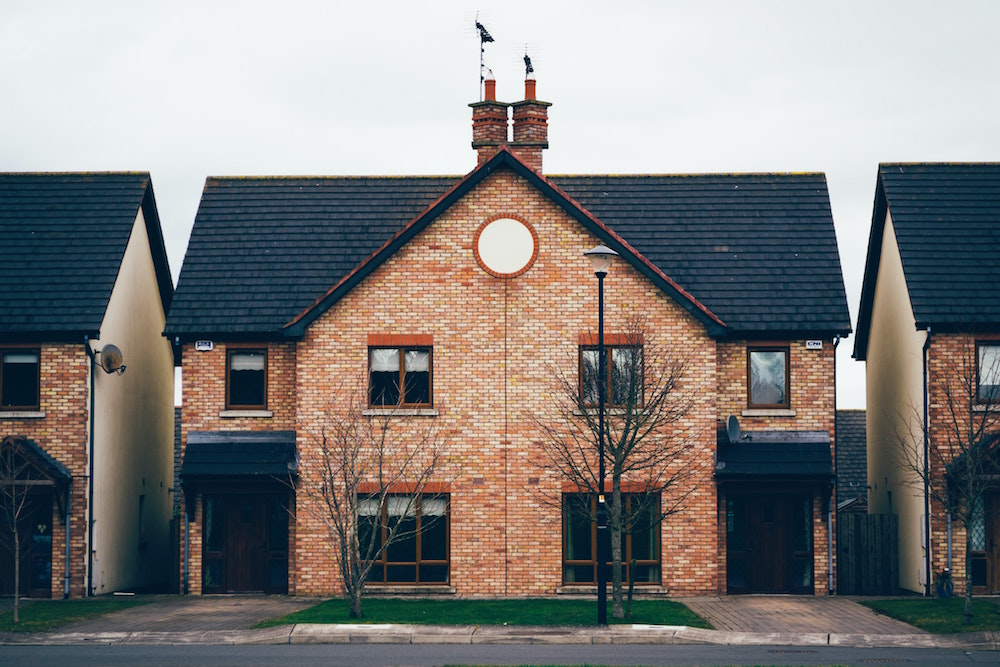 brick townhouses with dark roof