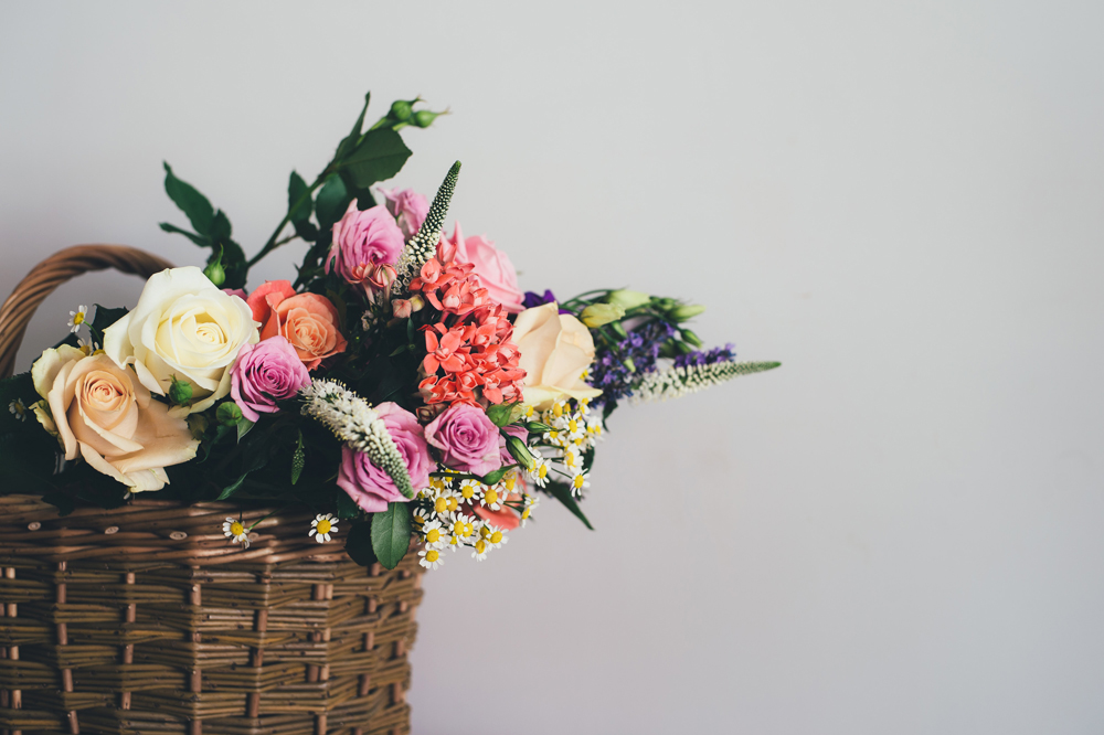 A bouquet of flowers in a basket