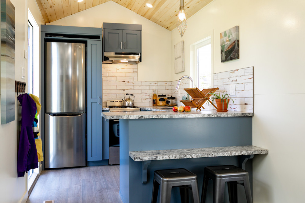 blue and white kitchen in tiny house