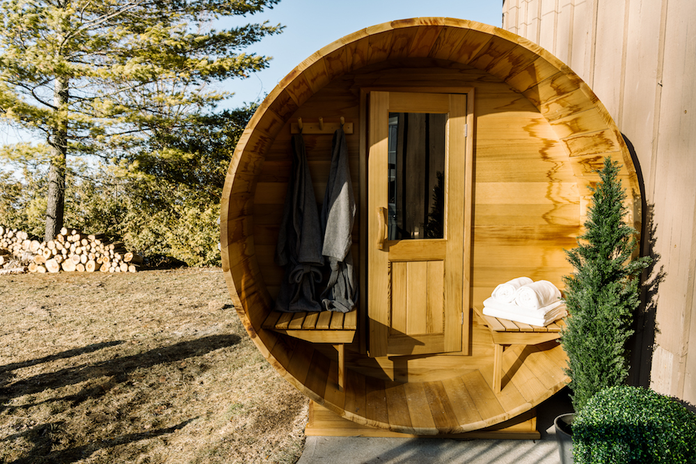 Exterior view of cedar barrel sauna entrance