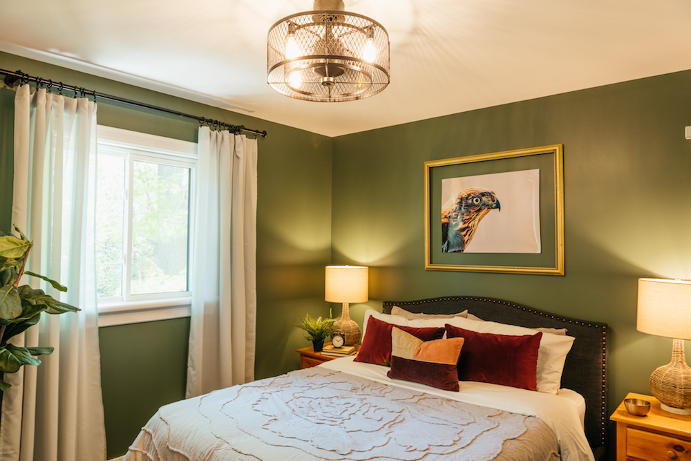 Primary bedroom with green walls