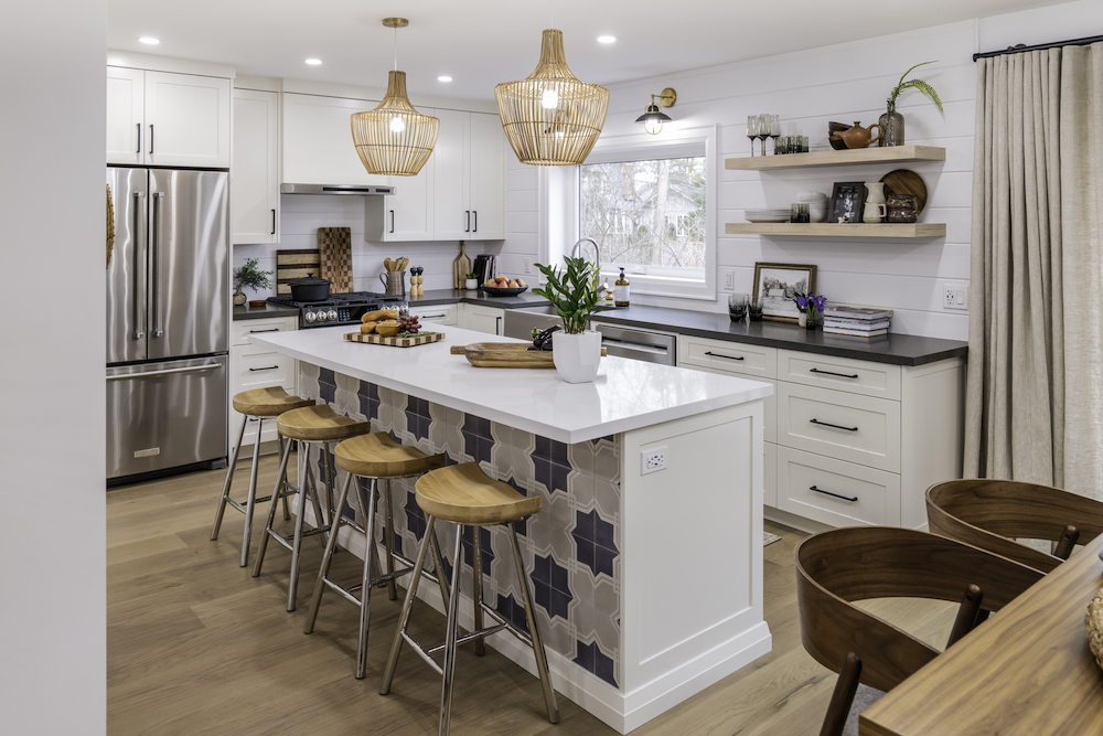 Farmhouse Chic A modern farmhouse kitchen with shiplap backsplash tiles and shaker cabinets