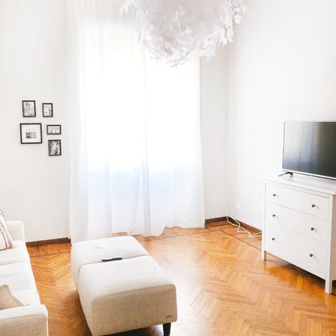 New hardwood floors in an apartment with white walls