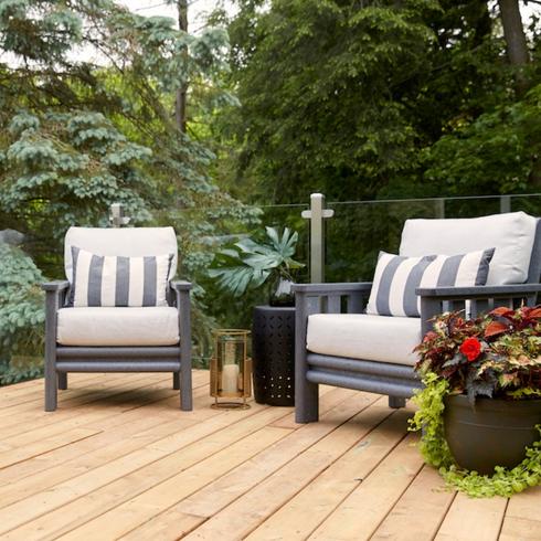 An outdoor patio set on a deck in the summertime