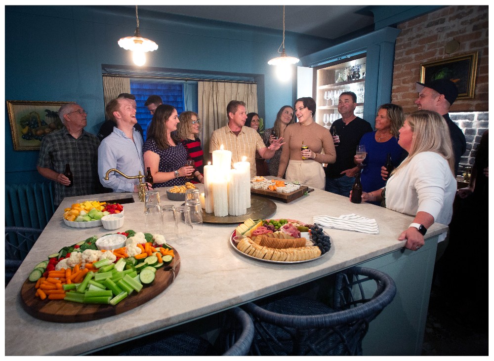 Randy and his team in the finished blue kitchen