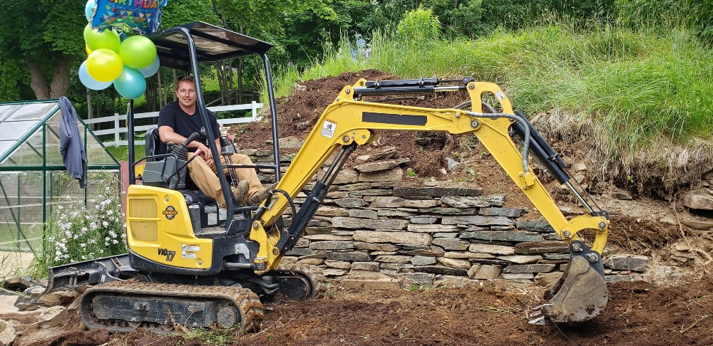 Randy Spracklin driving a digger