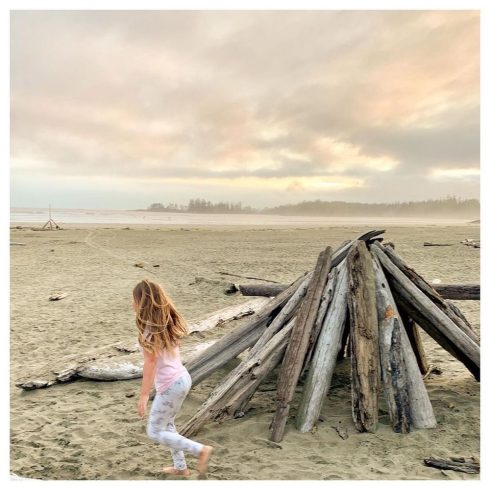 Youngest Baeumler daughter running on beach