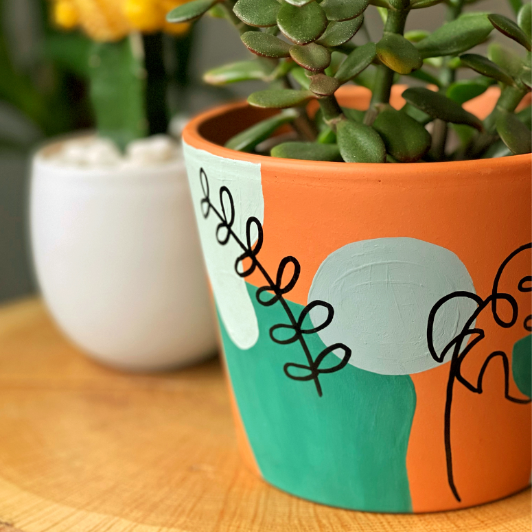 Close up of a painted terracotta pot