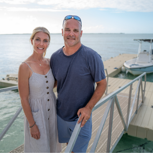 Bryan and Sarah Baeumler on a dock