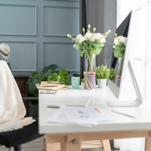 Home furniture setting corner for working at home casual furniture desk near window with white curtain