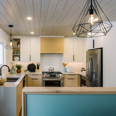 Open concept kitchen with blue and white