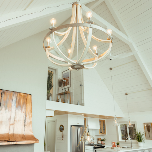 White cottage ceilings and chandelier