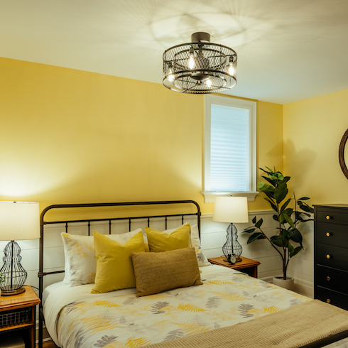 Yellow farmhouse bedroom