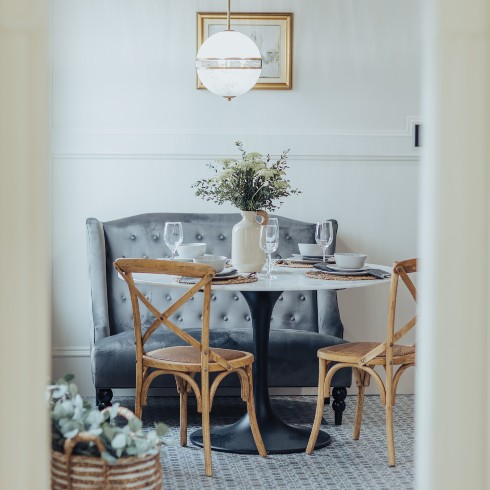 Dining area with sofa bench and seating