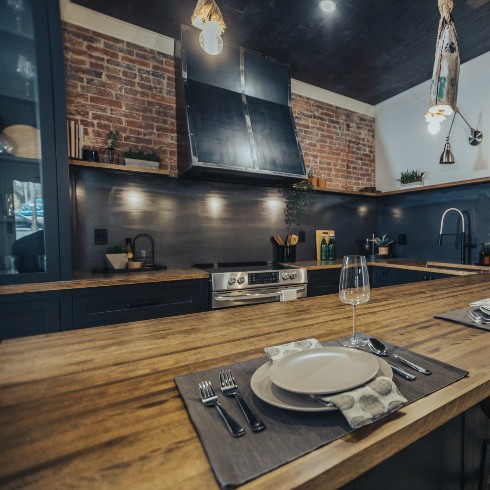 Kitchen with exposed brick