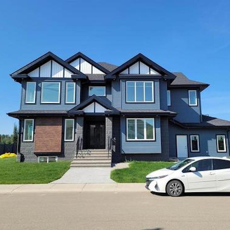 Modern home with blue/grey exterior in Edmonton