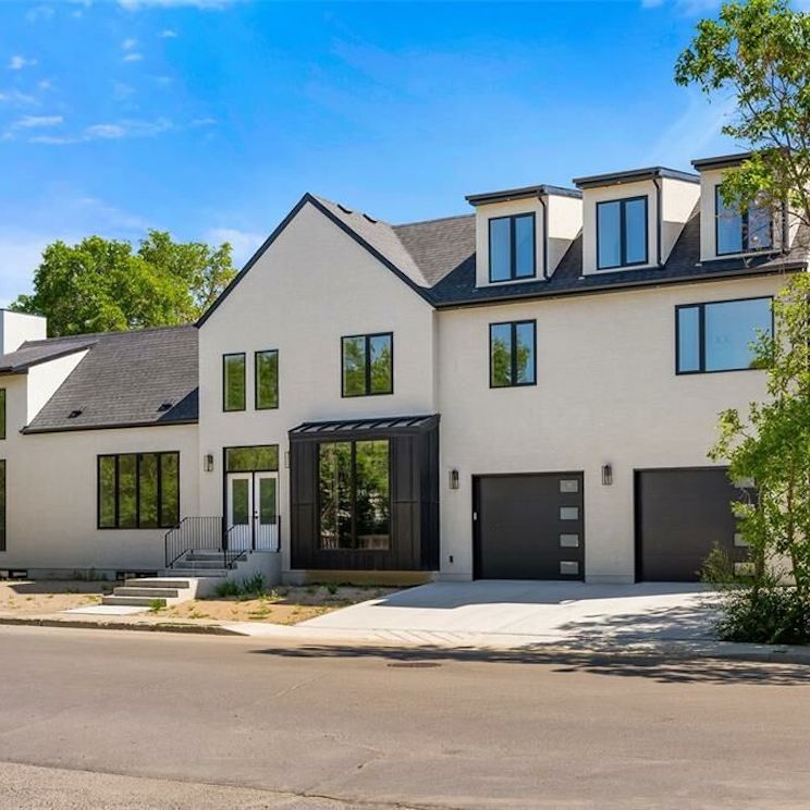 Modern white and black exterior detached home in Regina