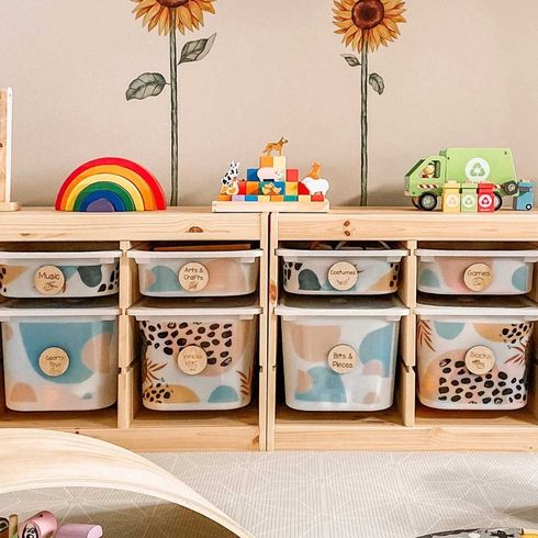 Organized toy bins decorated with terrazzo stickers