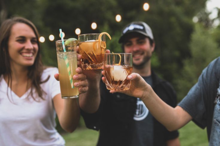 Friends toasting cocktails 