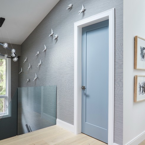 Blue hallway with bird decor