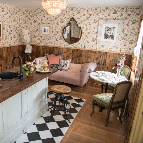 A wide shot of the front room at The Roadhouse highlighting the black and white checkered floor