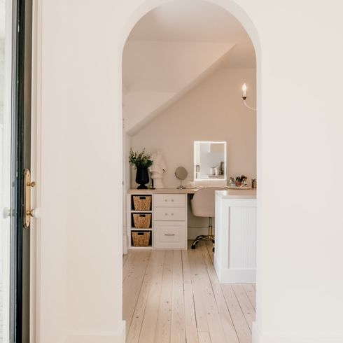 Arched doorway into closet