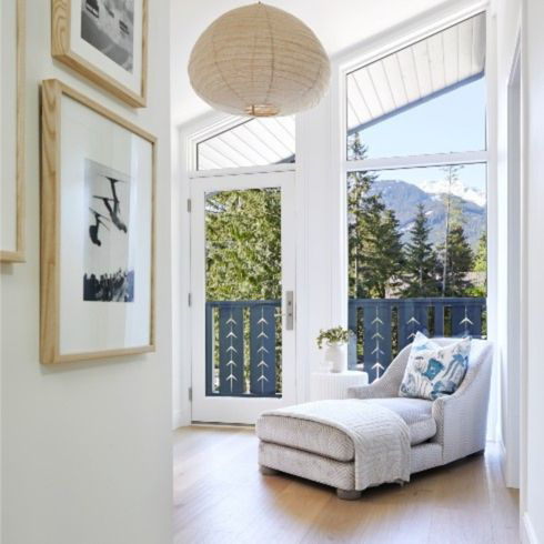 Chaise lounge in primary bedroom suite