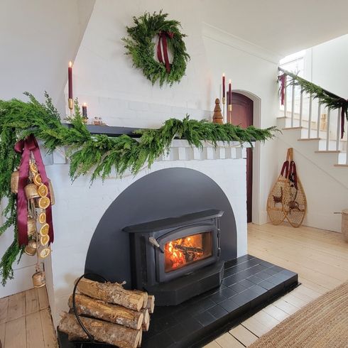 Fireplace mantle decorated for Christmas