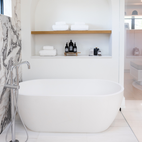 Large soaker tub in ensuite bathroom