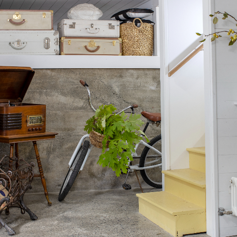 A shot of the landing stairs in Pamela Anderson's renovated basement