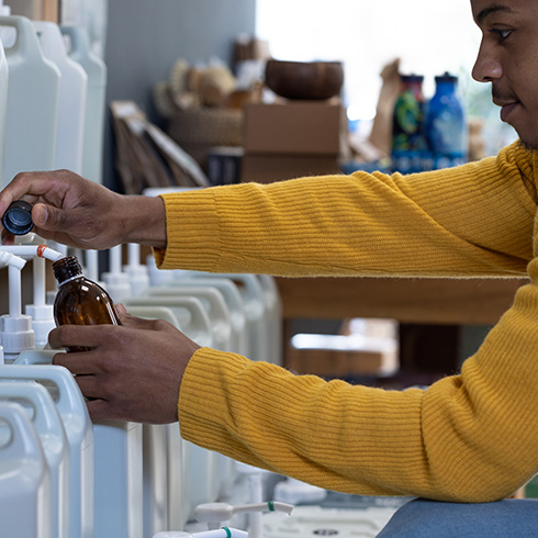 Person refilling bottles