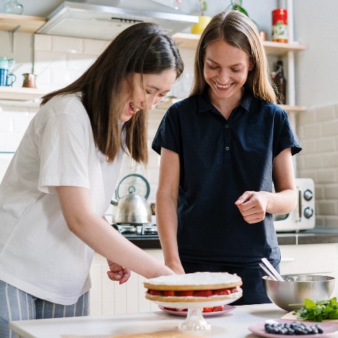 Friends baking in a kitchen