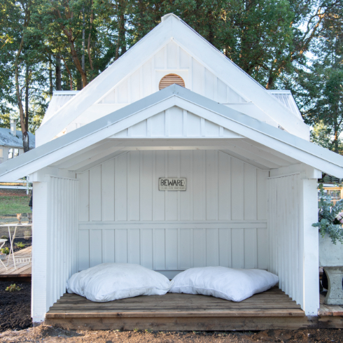 The dog cupboard with pet beds in the new potting shed