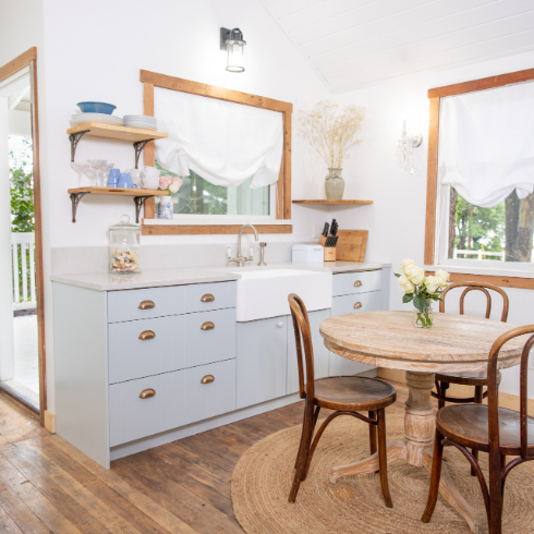 A shot of the new cabin kitchen, with pale blue cabinetry