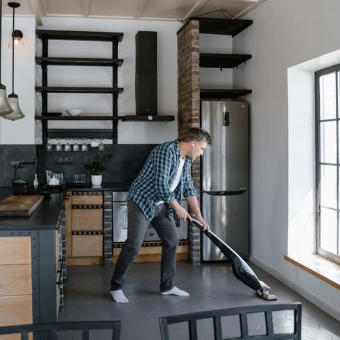 Man cleaning his floors