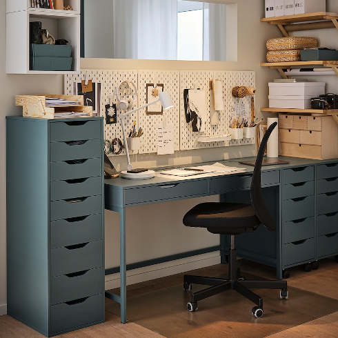 The Alex IKEA table in a gray-turquoise colour with multiple shelfs