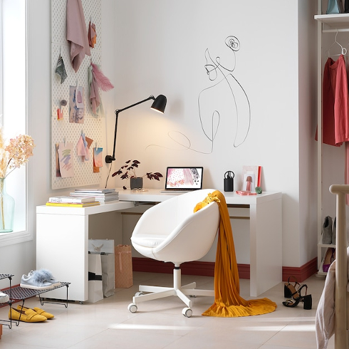 A white combination desk in a teen bedroom